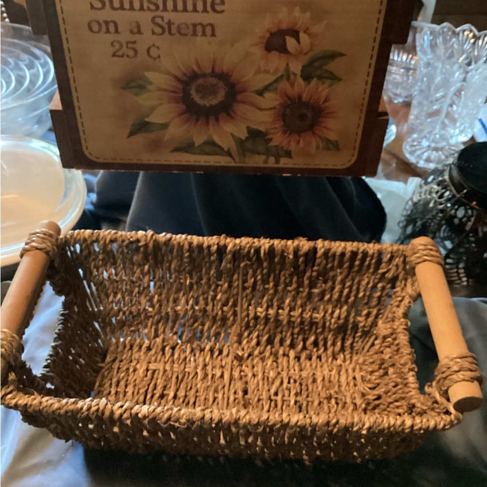2 containers, 1 wooden with sunflowers, one woven with wooden handles. - Picture 2 of 13